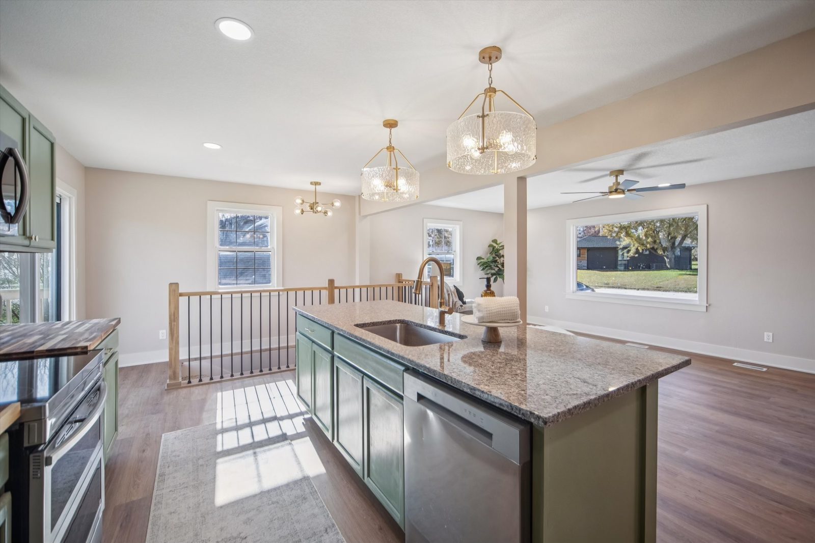 Open kitchen remodel with island seating and natural light